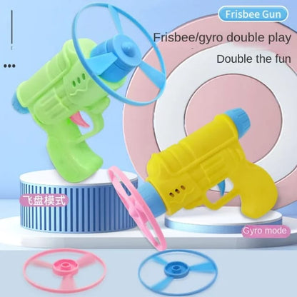 PLASTIC TOY GUN WITH FLYING SAUCER